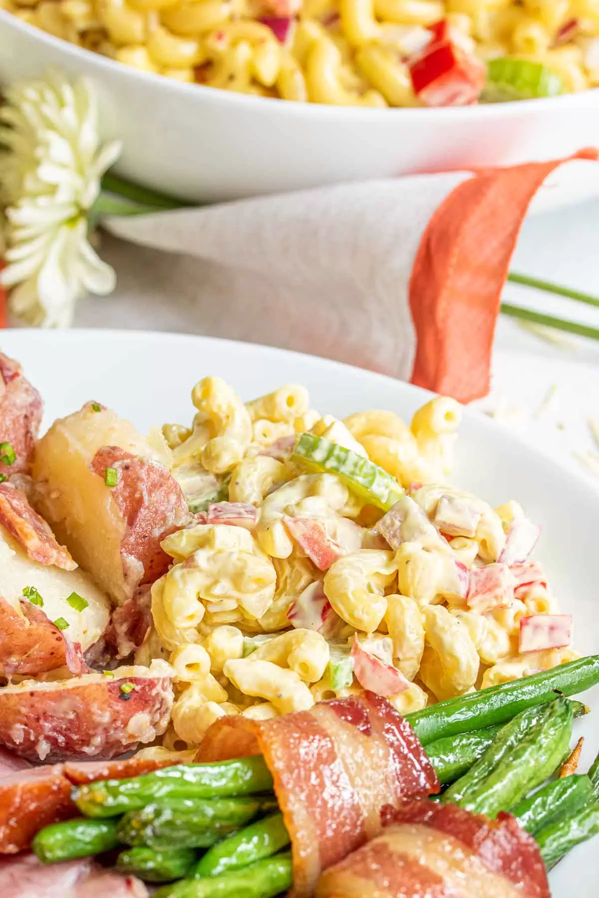 Classic Macaroni Salad and easter recipes on a white plate