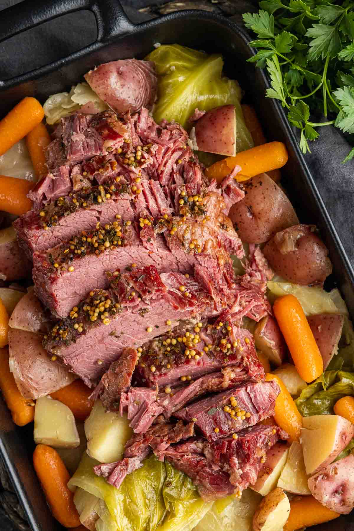 platter with black platter with sliced Instant Pot Corned Beef
