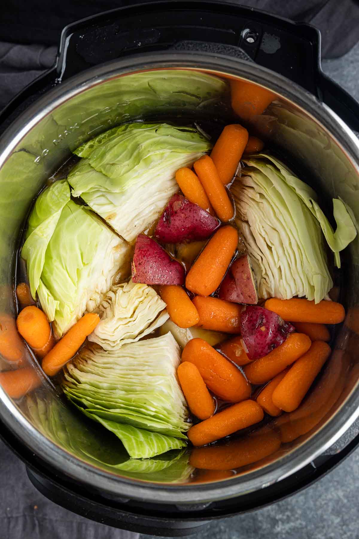 how to layer Instant Pot Corned Beef in a pressure cooker