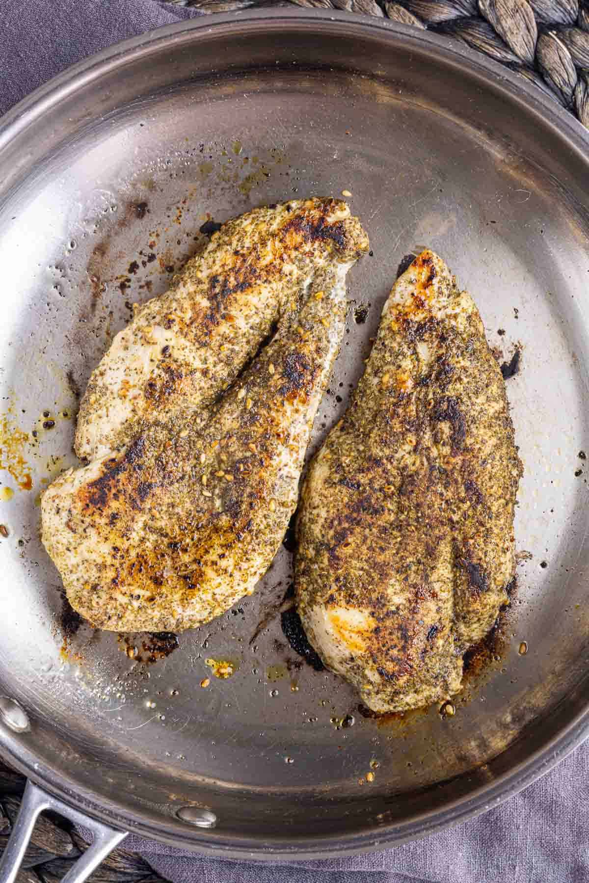 cooking Za’atar Chicken in a skillet