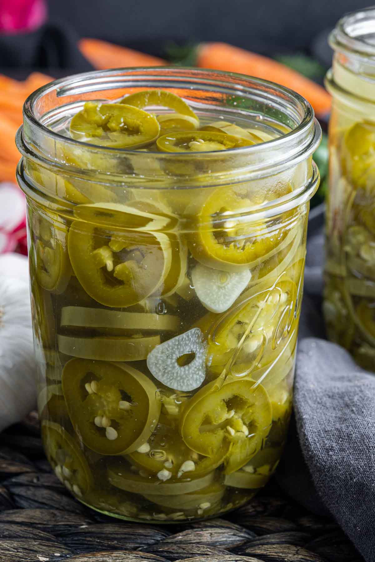 open mason jar filled with Pickled Jalapenos