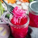 Pickled Red Onions on a fork