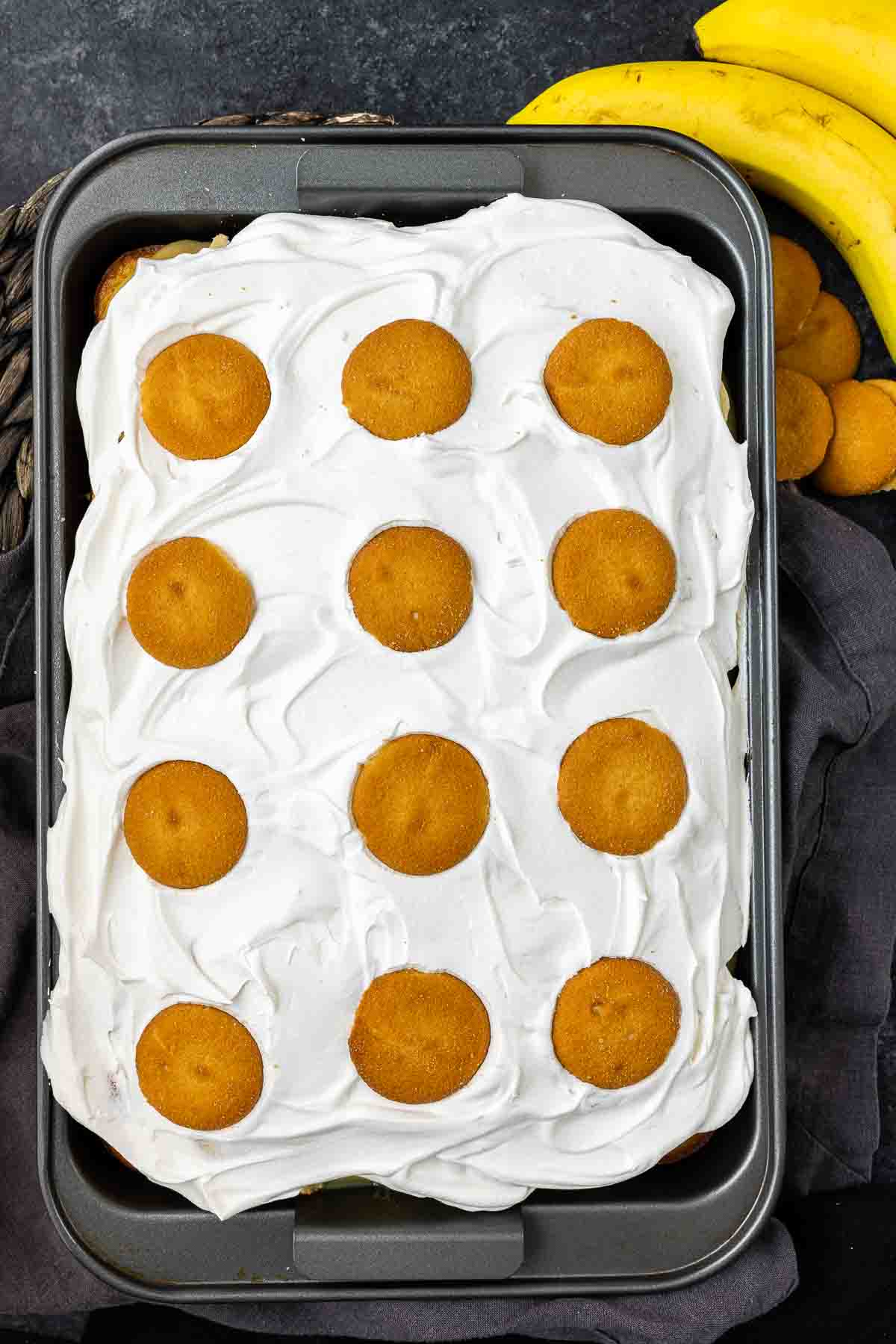 Banana Pudding Cake topped with Nilla and cool whip