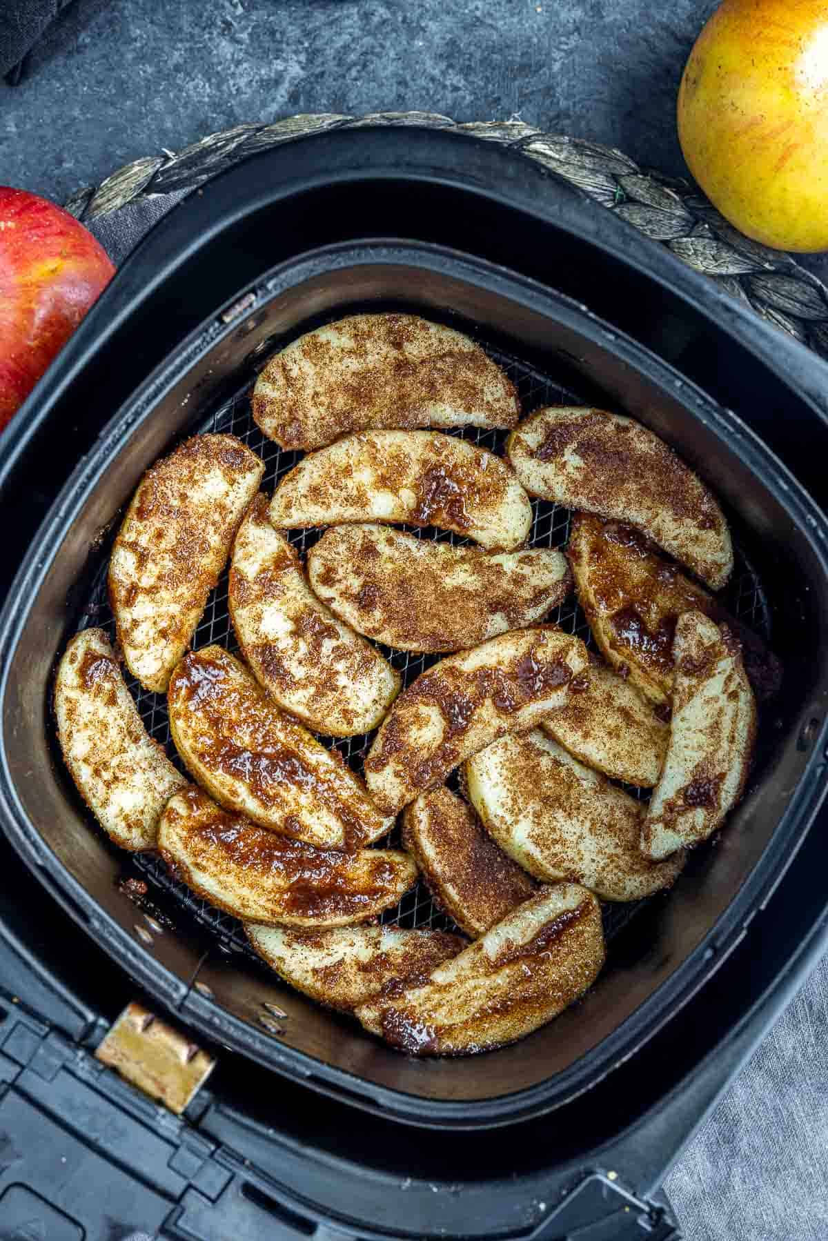 Air Fryer Baked Apple Slices in the air fryer basket