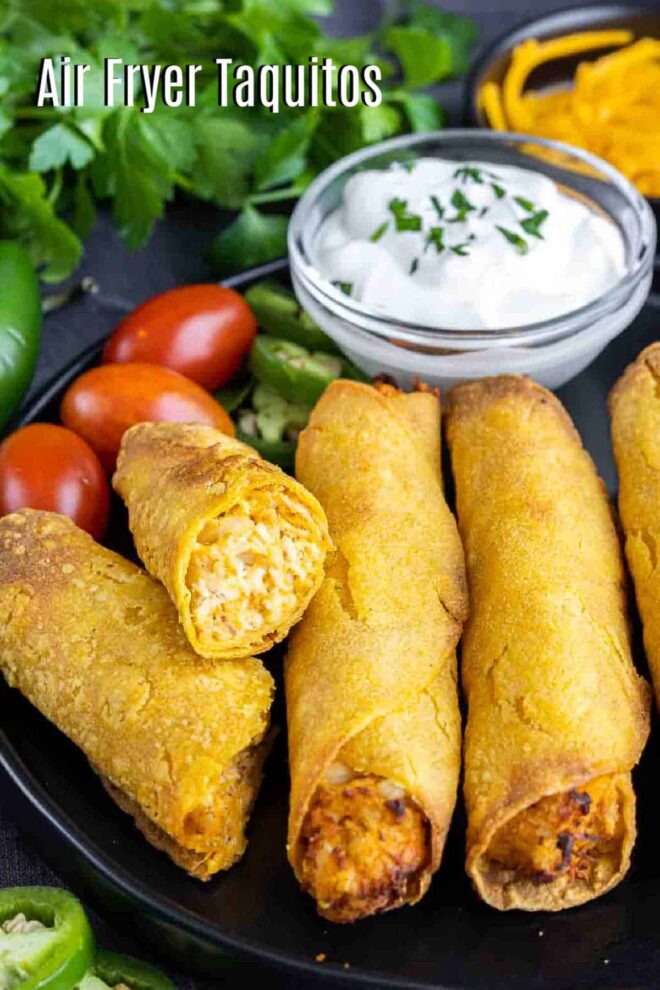 pinterest image of Air Fryer Taquitos on a plate with sour cream