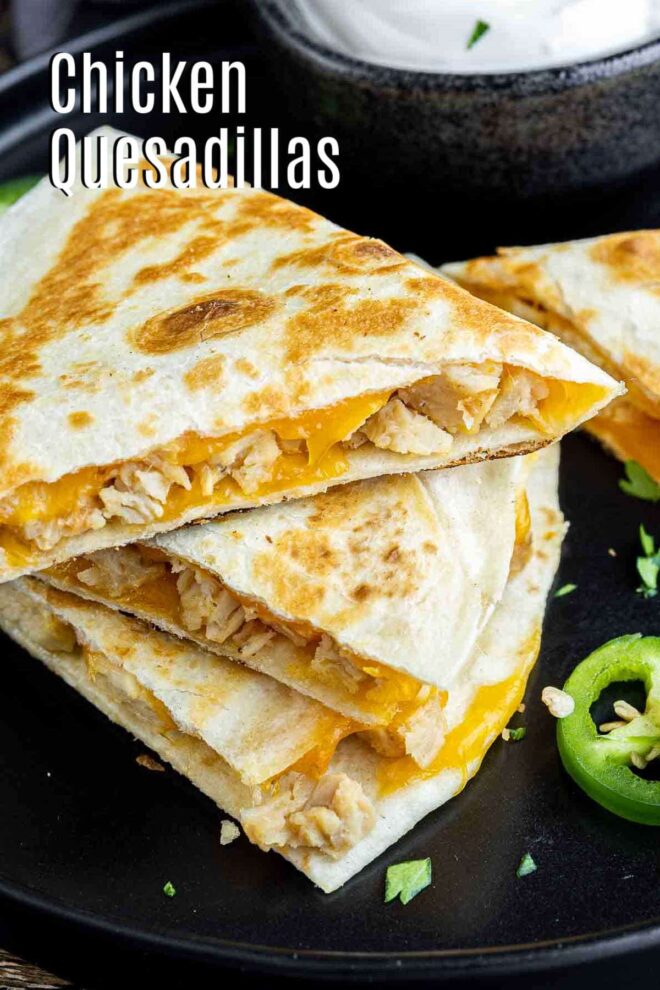 pinterest image with Chicken Quesadillas on a black plate