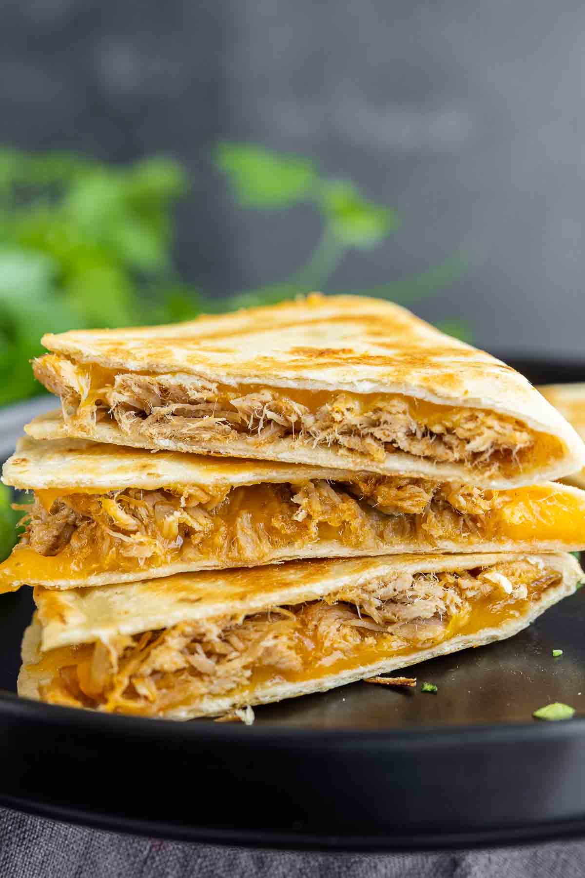 stacked Pulled Pork Quesadillas on a plate
