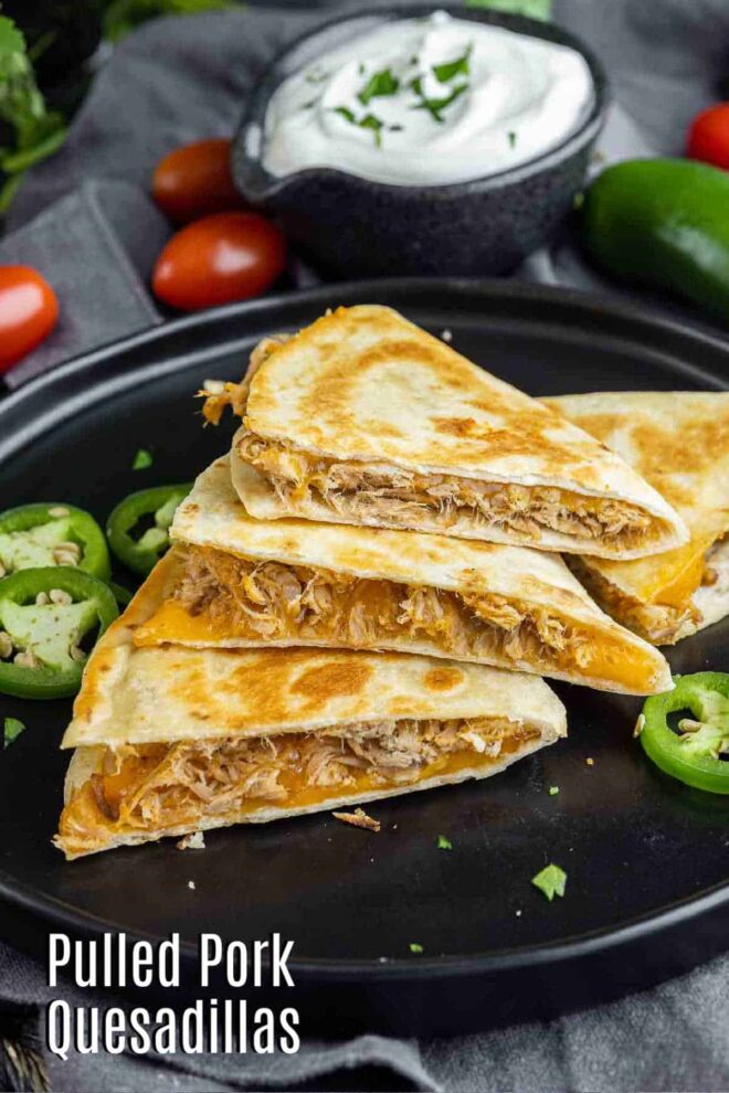Pinterest image of Pulled Pork Quesadillas on a black plate