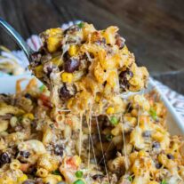spoon if Taco Mac and Cheese Casserole with beans