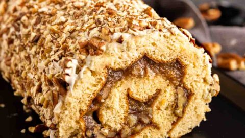 Pecan Pie Cake Roll on a black platter