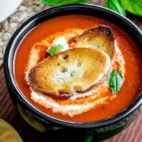 Roasted Red Pepper Soup in a black bowl