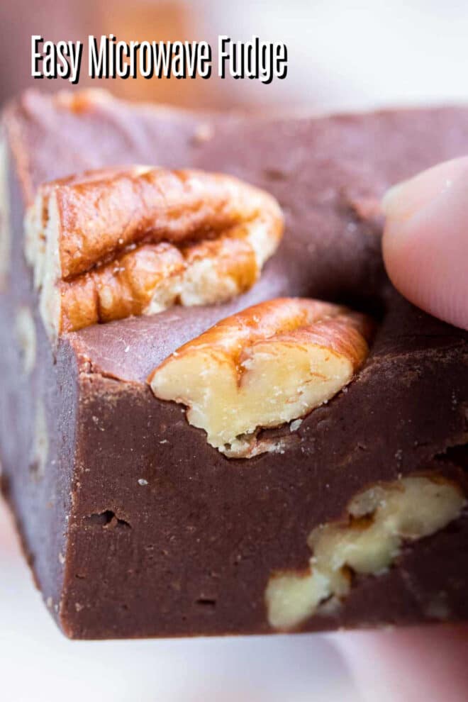 pinterest image of holding Easy Microwave Fudge square
