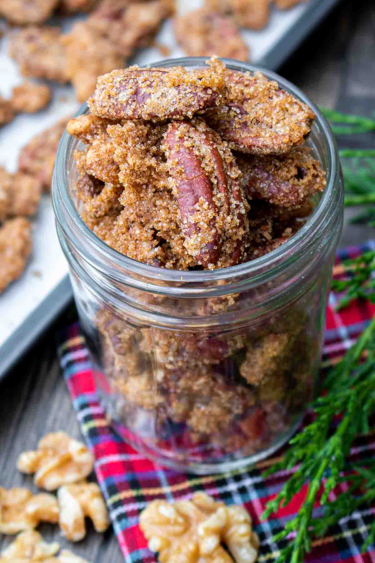 mason jar over filled with candied nuts