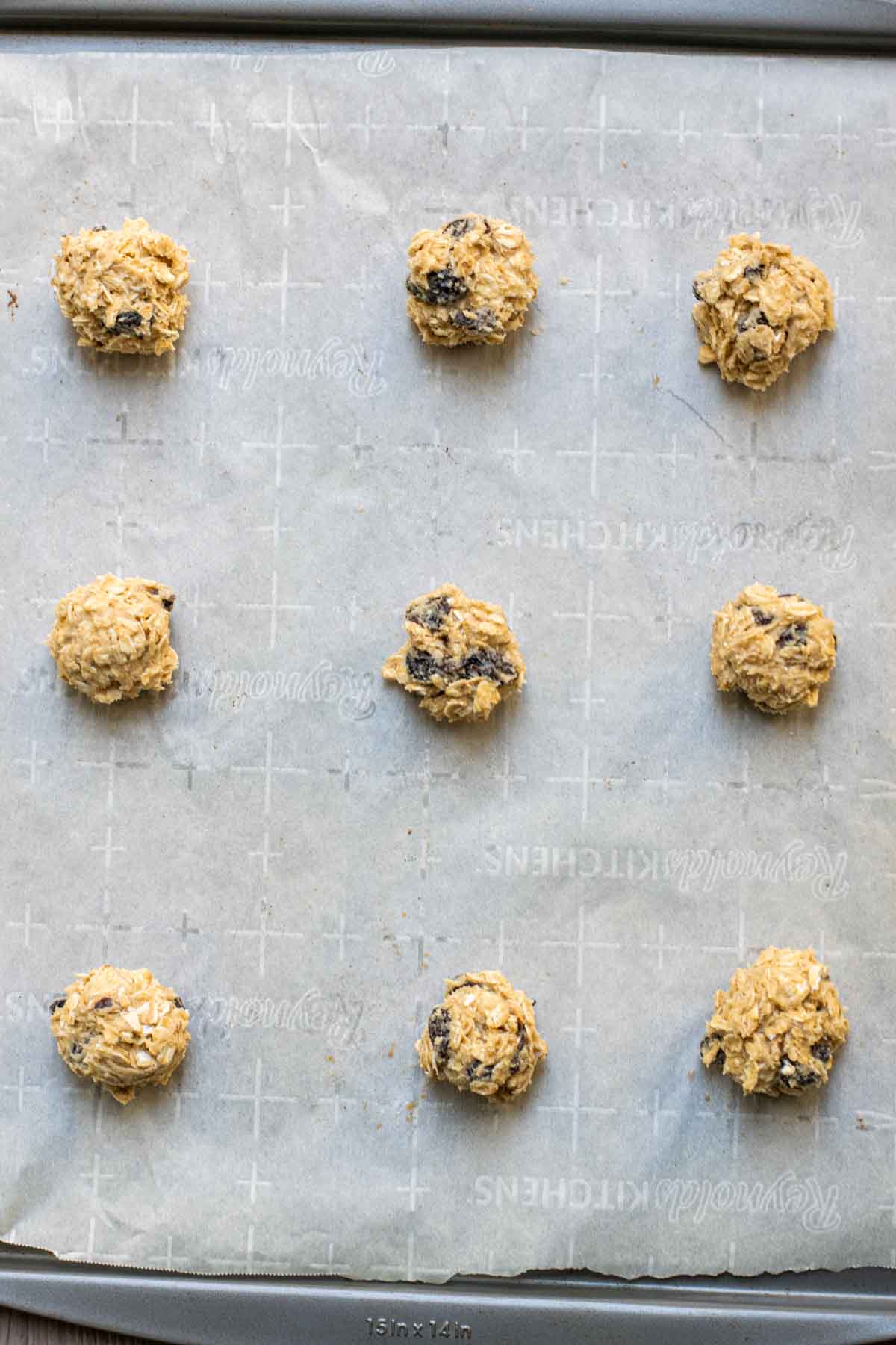 oatmeal raisin cookies dough on cookie sheet