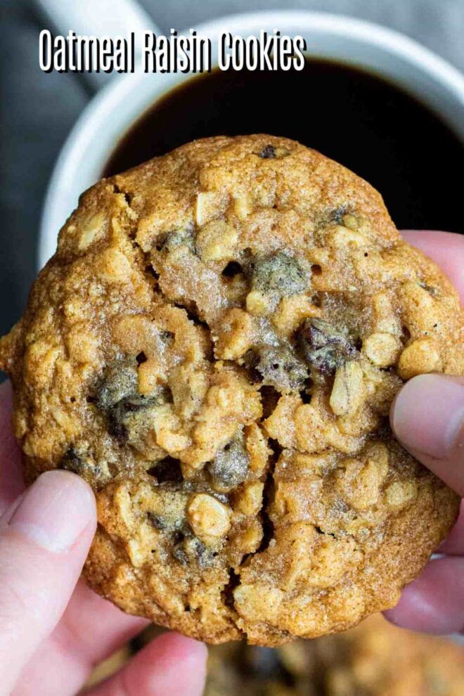 pinterest image of holding chewy oatmeal raisin cookies