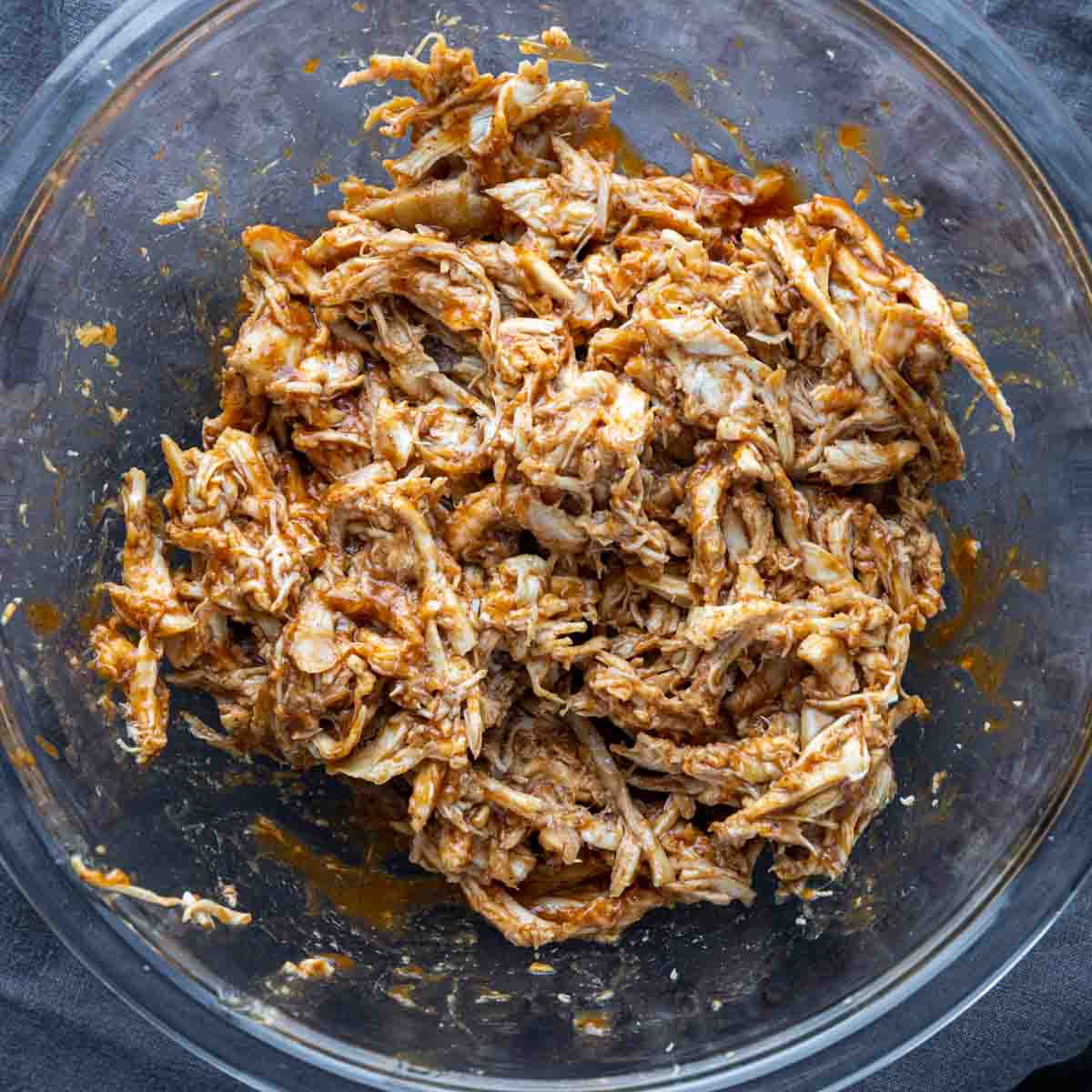 shredded chicken and BBQ sauce in a bowl