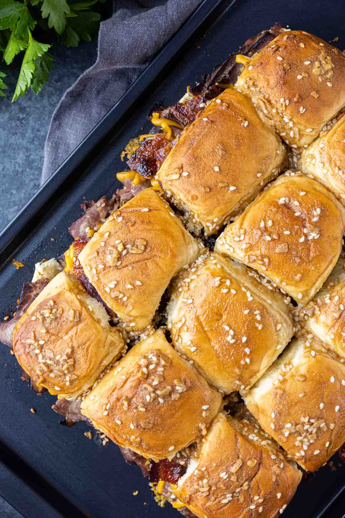 sheet pan with Roast Beef Sliders with Brown Sugar Bacon
