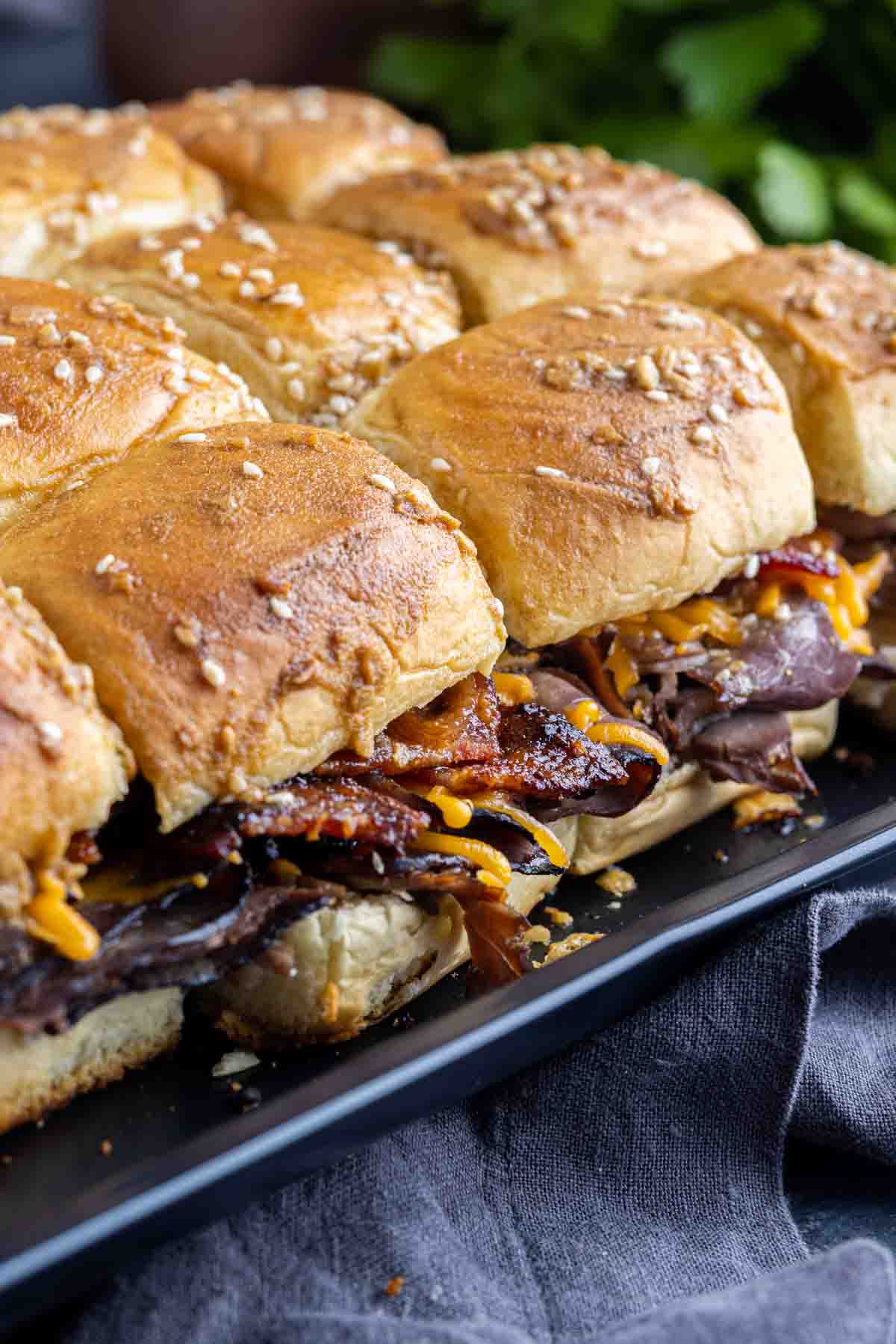 Roast Beef Sliders with Brown Sugar Bacon and cheddar cheese