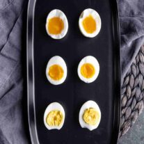 overhead view of air fryer eggs