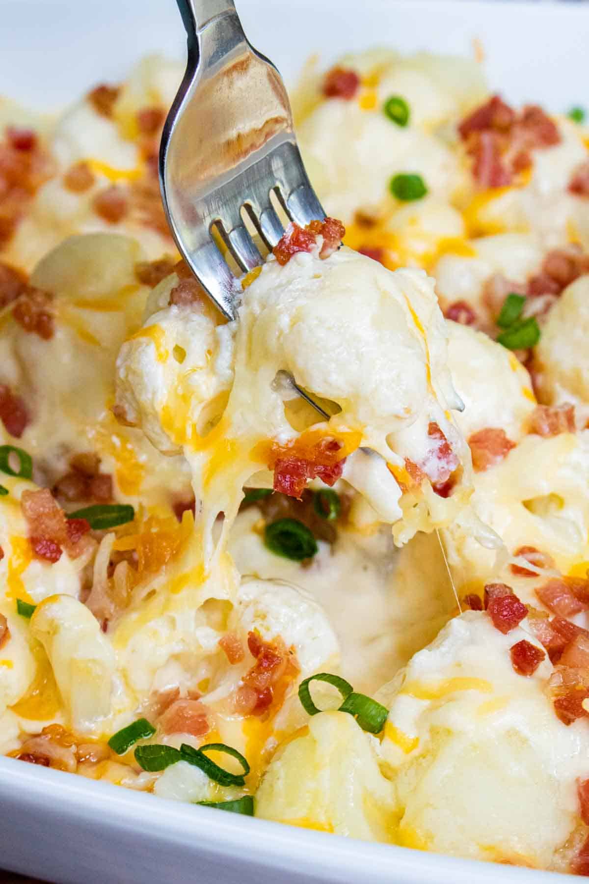 Baked Cauliflower with Cheese Casserole on fork