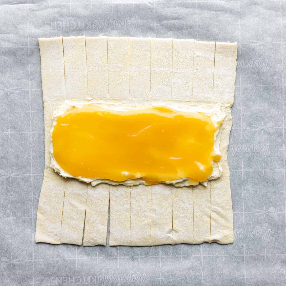 filling a Lemon Cream Cheese Danish