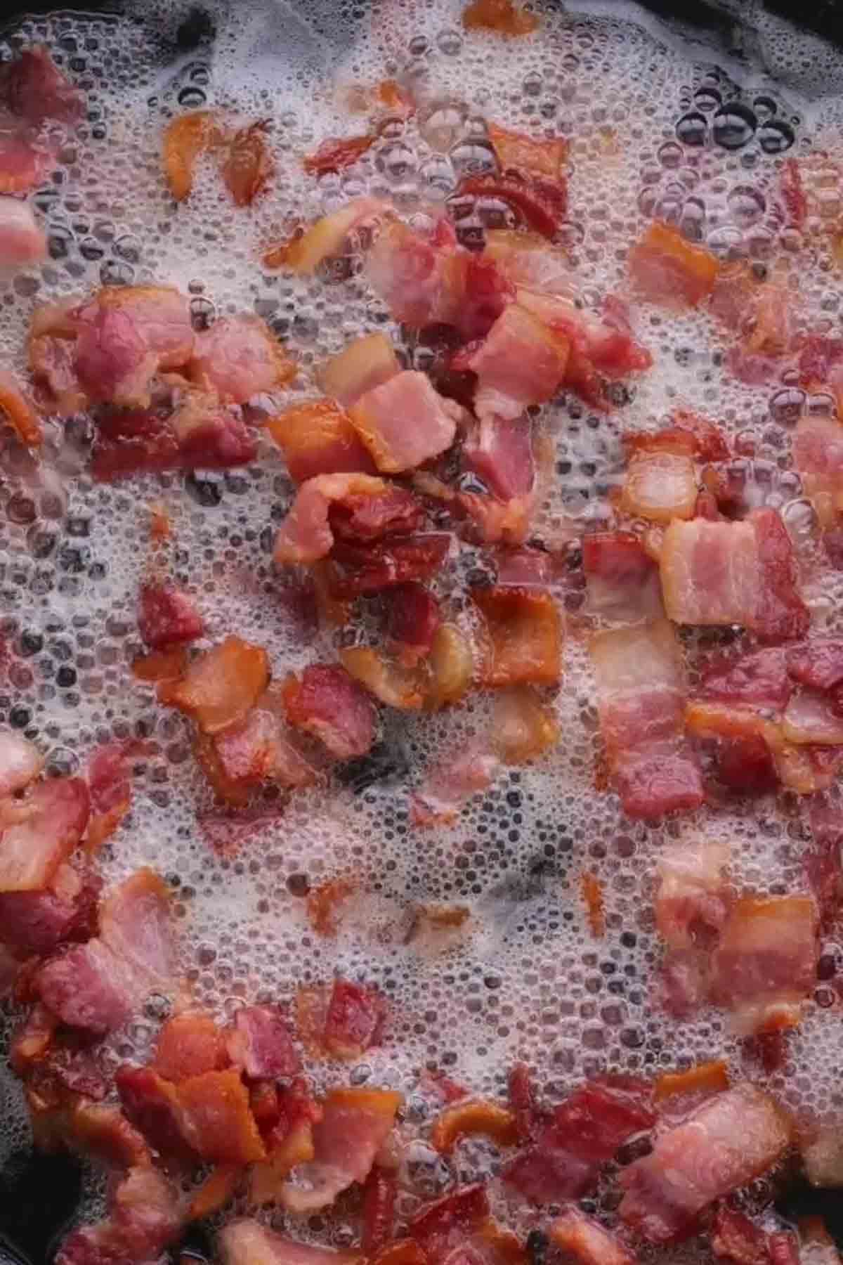 bacon cooking in grease