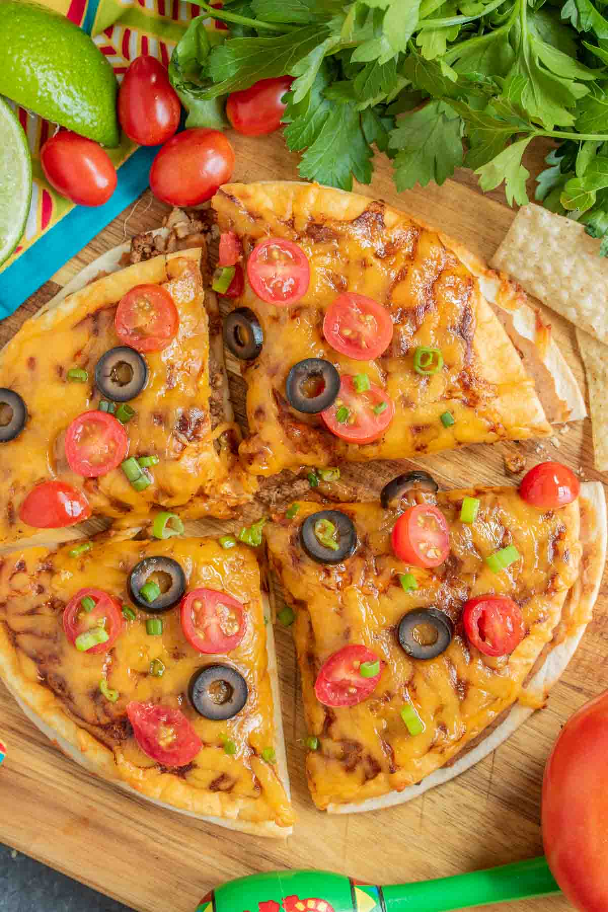Taco Bell Mexican Pizza with parsley and tomatoes