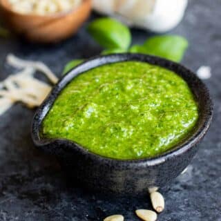 small sauce bowl filled with basil pesto