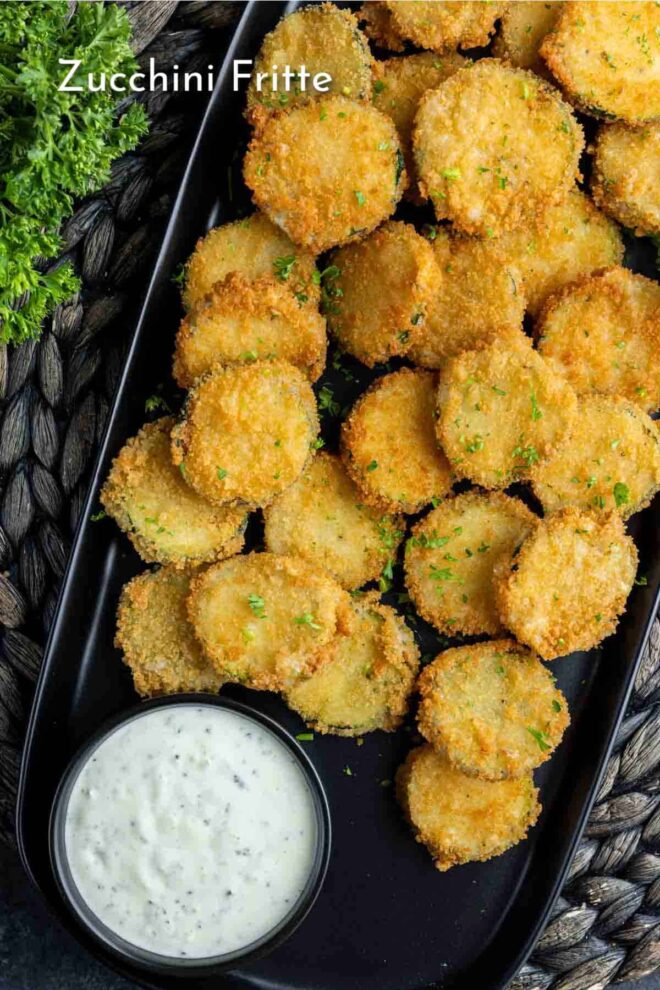 pinterest image of Zucchini Fritte on a blacl platter