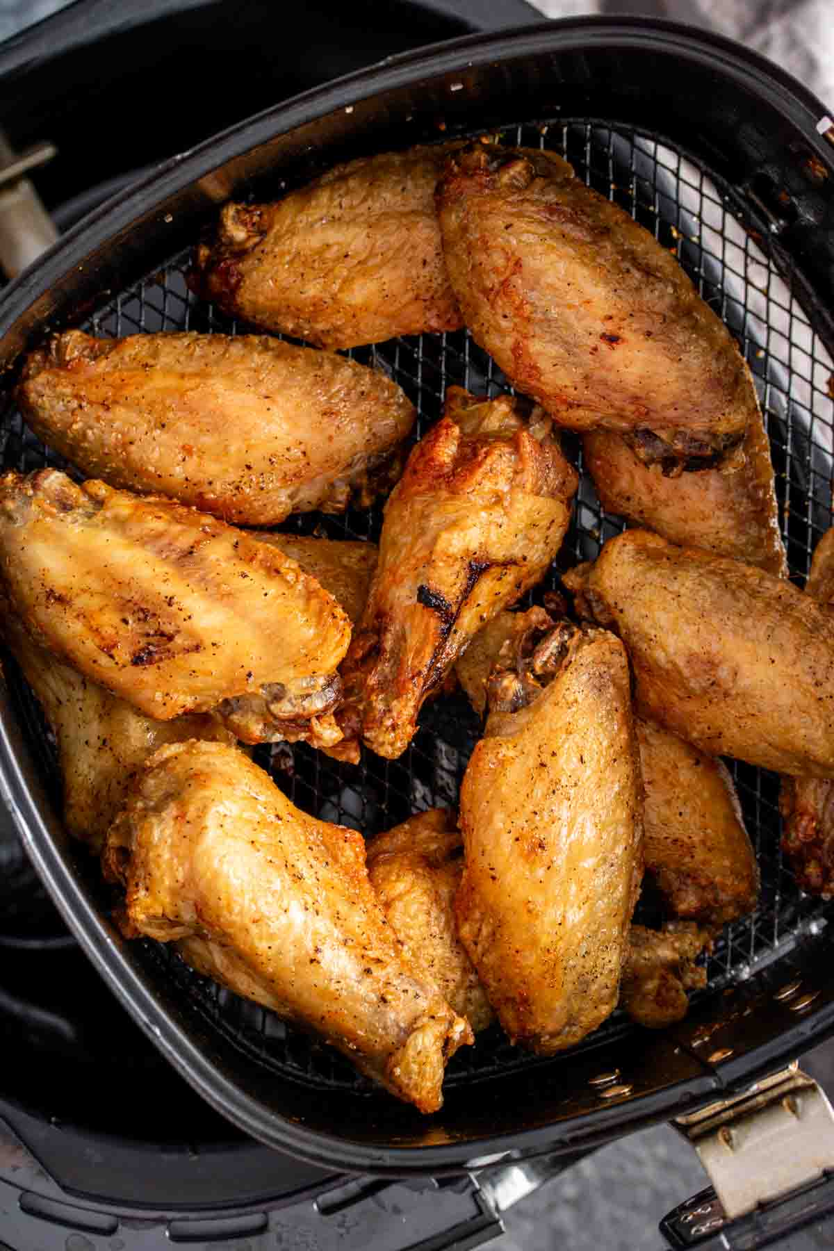 Air Fryer Chicken Wings in an air fryer basket
