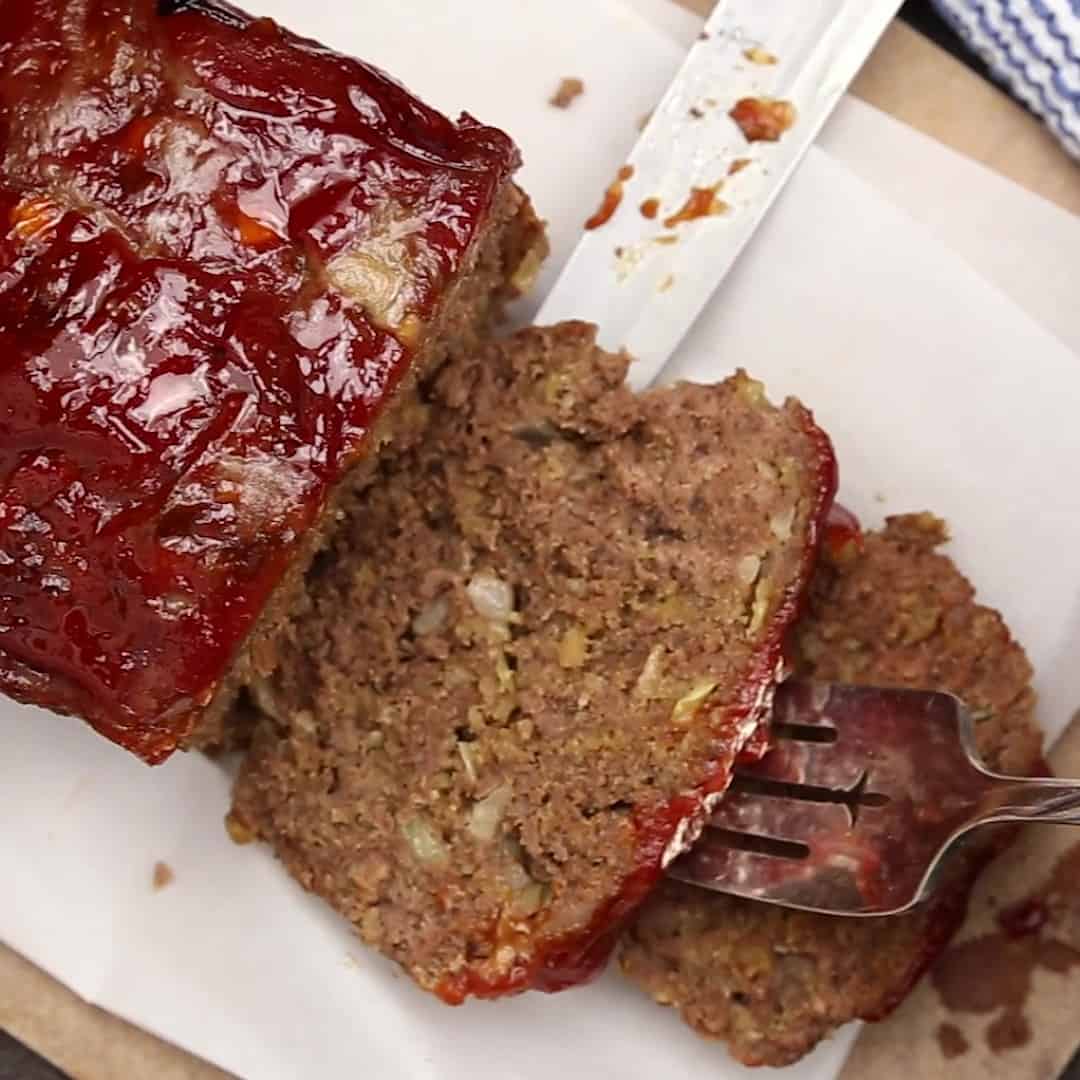 A slice of keto meatloaf with a fork.