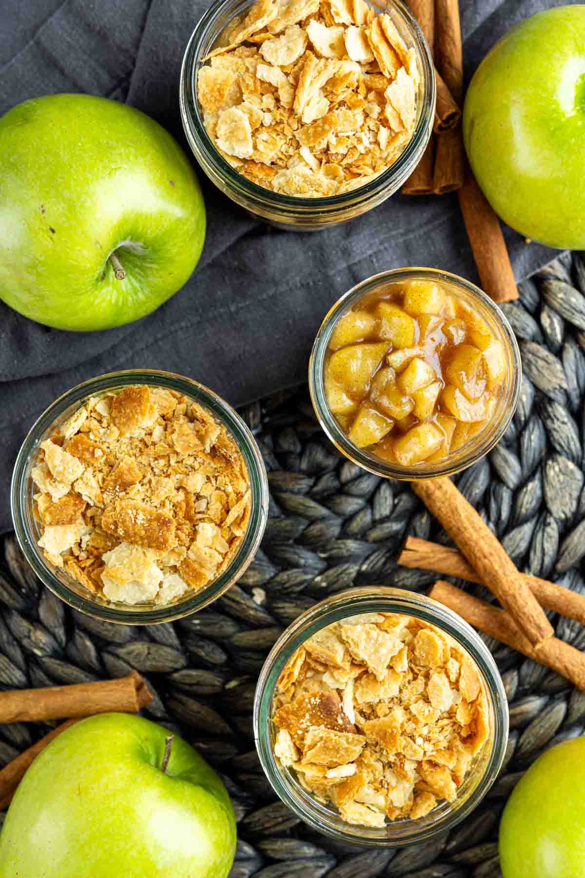 apple pie in a jar with cinnamon and apples.
