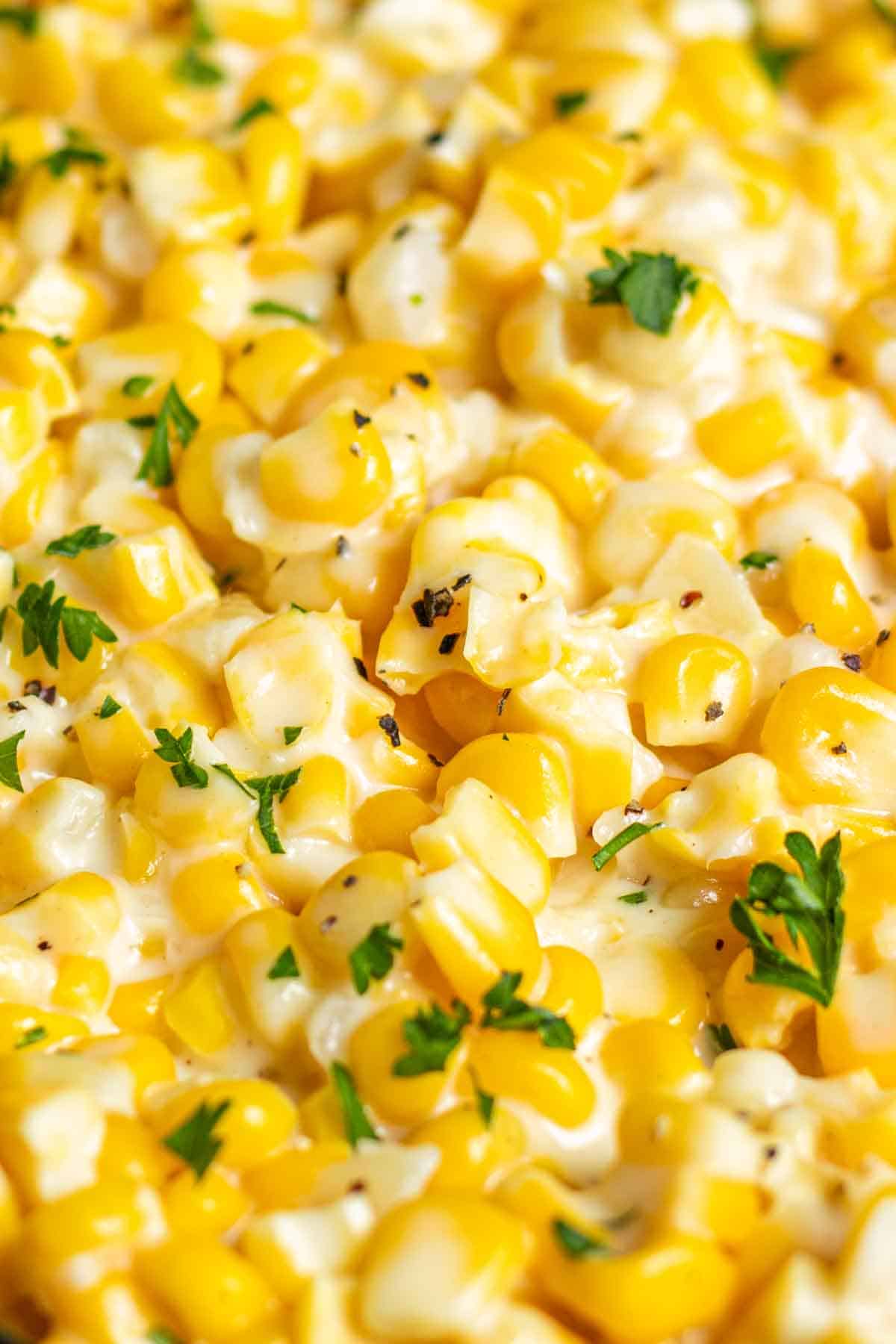 A close up of a dish with Creamed Corn
