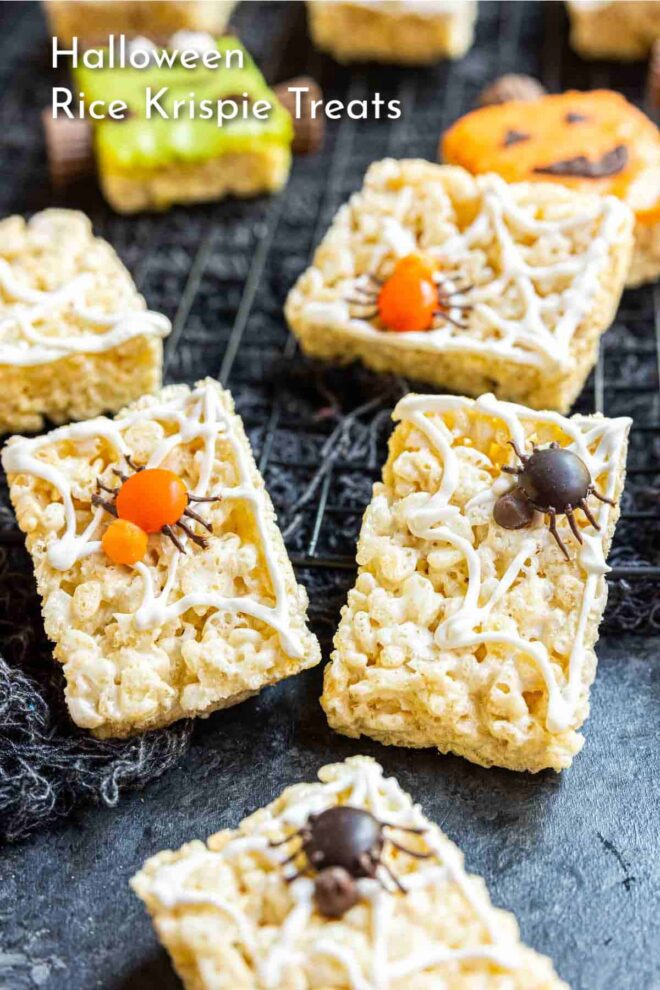 Halloween rice krispy treats on a cooling rack that look like a spider and cobweb