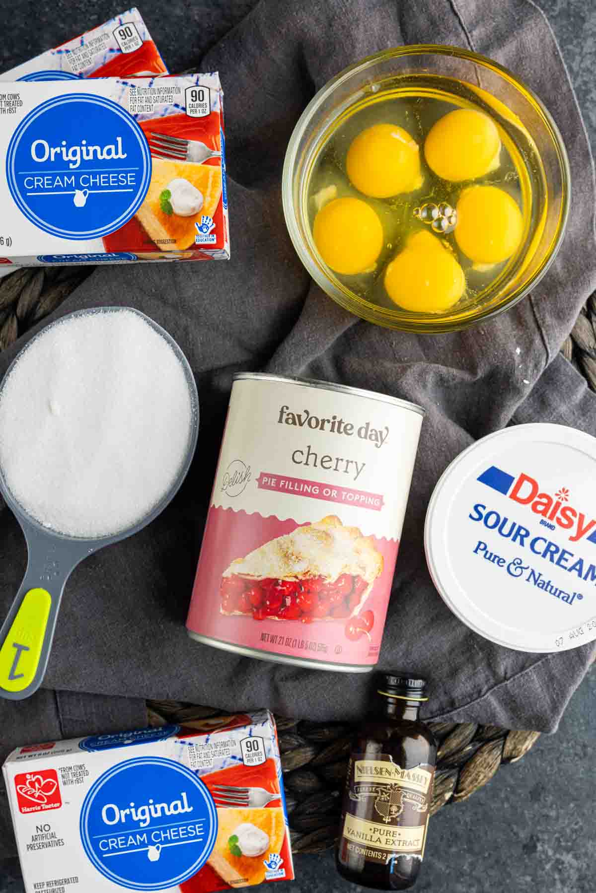 The ingredients for a Mini cheesecake are shown on a table.