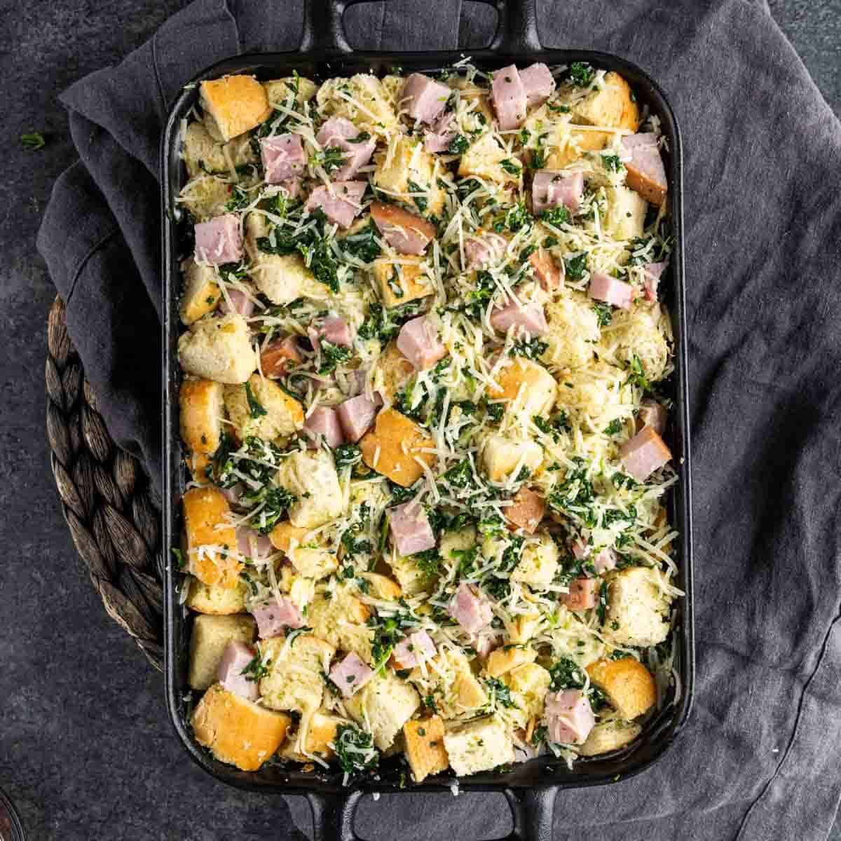 Ham and Cheese Strata in a black baking dish.