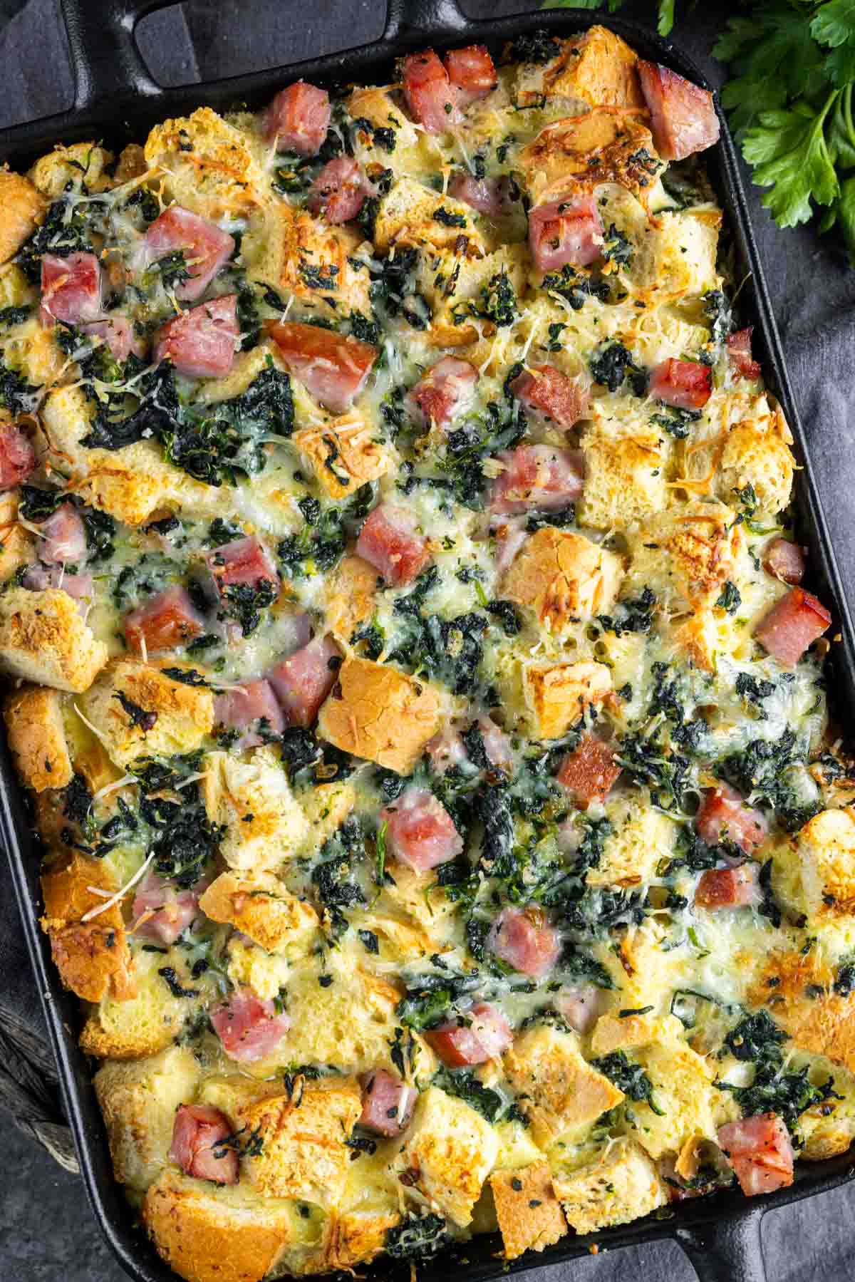 Ham and Cheese Strata in a cast iron pan.