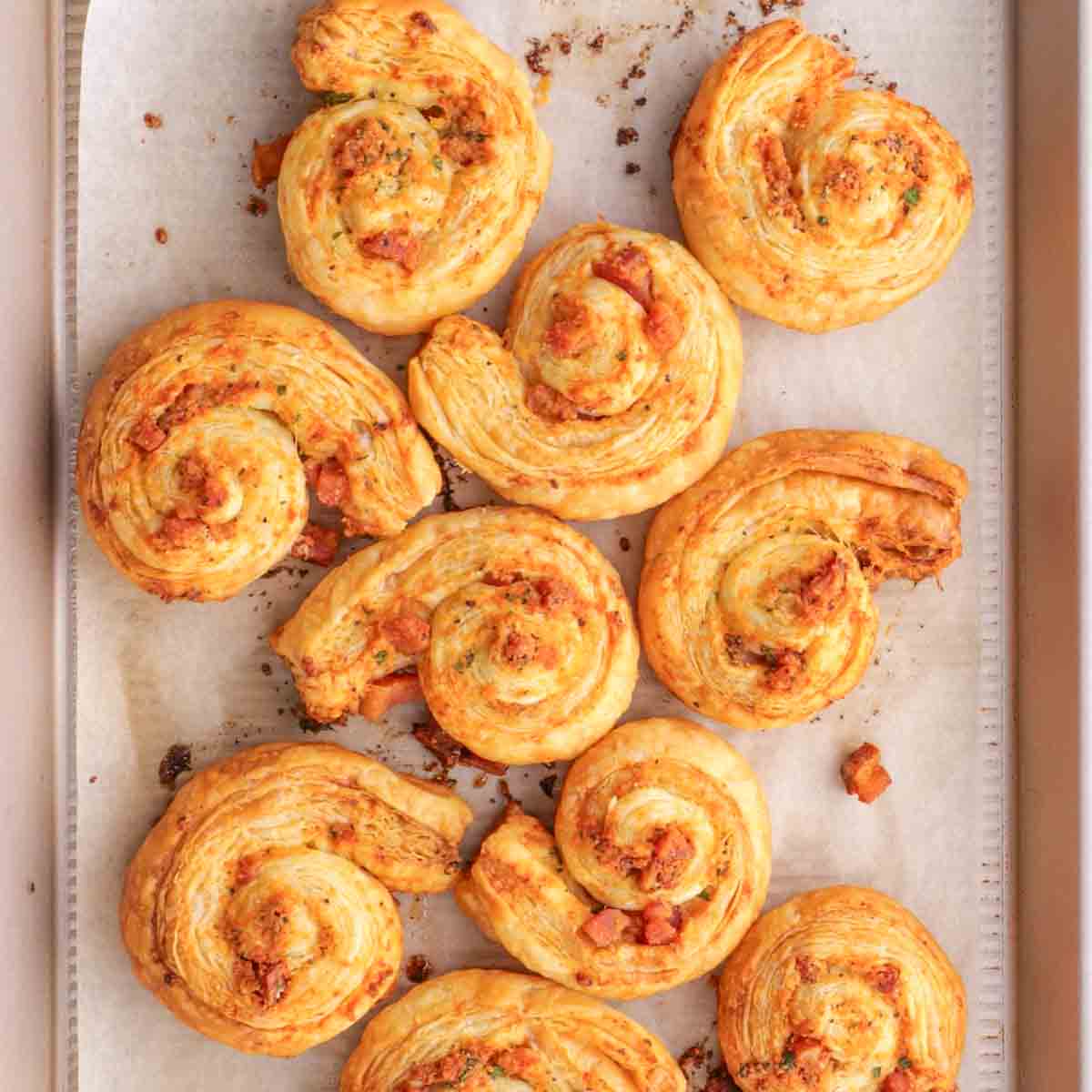 A baking sheet with a tray of pastries on it.