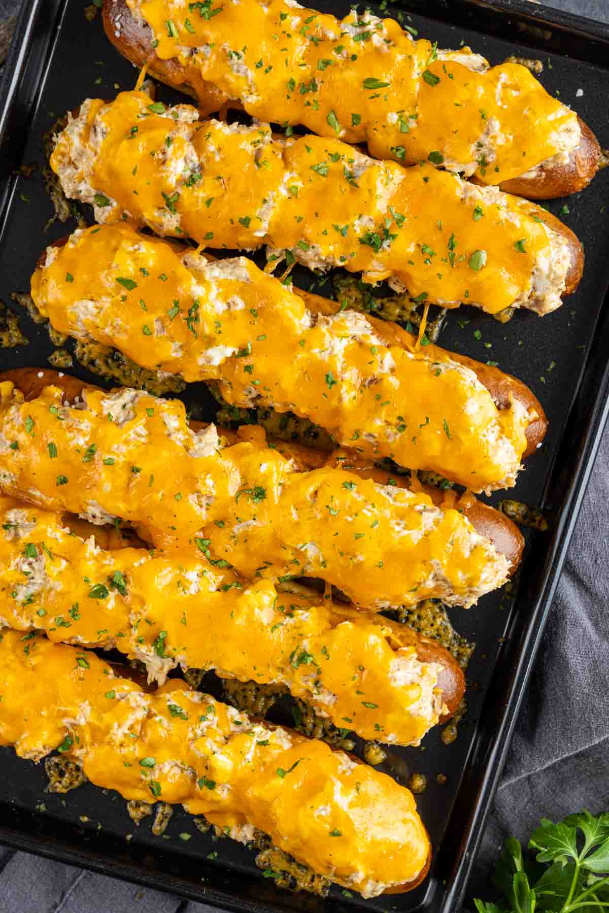 A tray of Crab Pretzel with cheese and herbs.