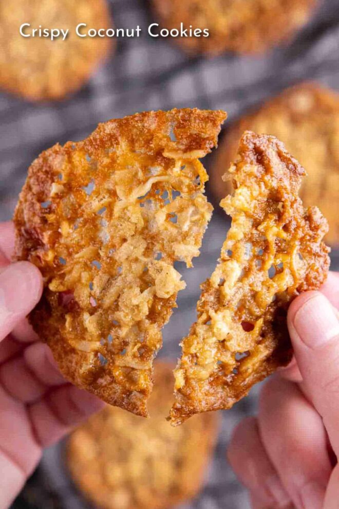 Pinterest picture person is holding a piece of Crispy Coconut Cookies