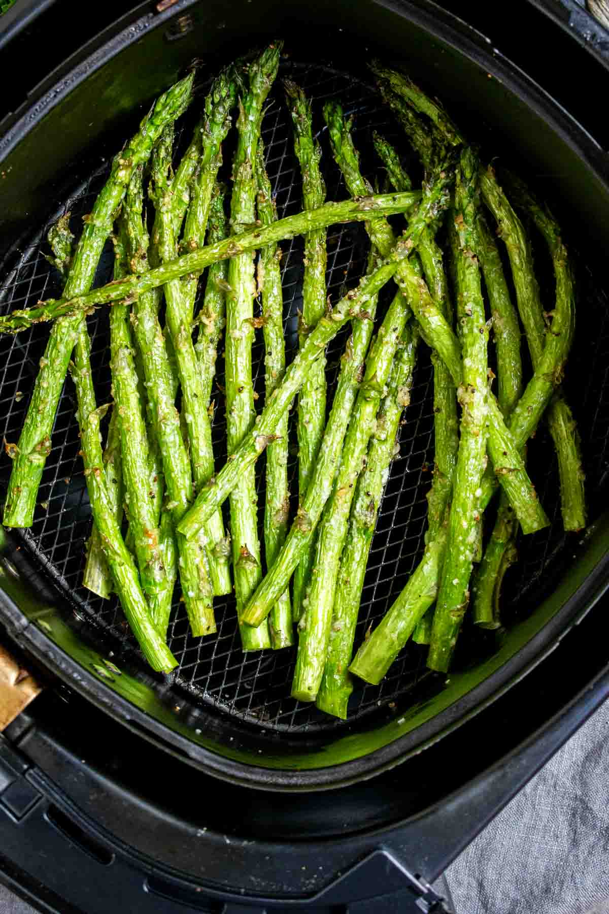 Air Fryer Asparagus in an air fryer.