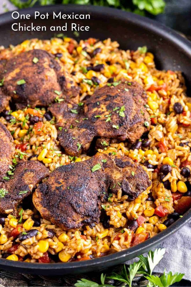pinterest image of One-pot mexican chicken and rice served in a skillet, with a close-up on the spicy, flavorful dish.