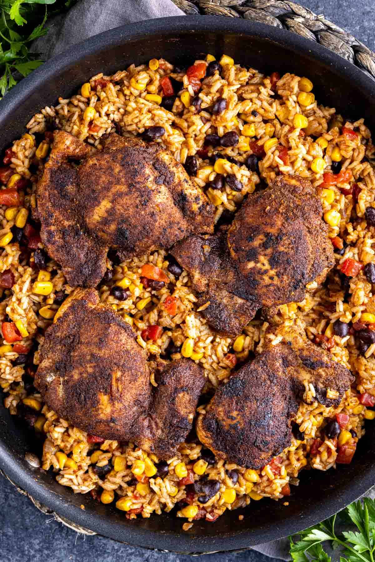 A skillet One pot mexican chicken and rice with beans and corn.