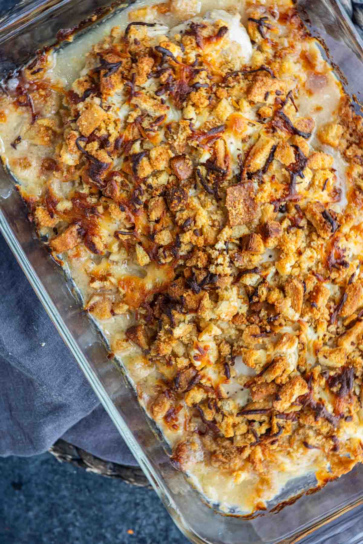 Chicken Caesar Bake with a golden crouton topping in a casserole dish